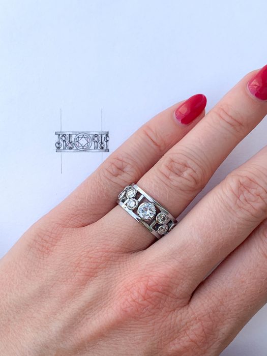 Platinum bespoke ring created by remodelling inherited diamond jewellery into a modern open-frame design.