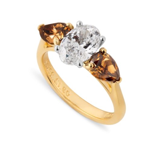 Oval & Pear Cut Three Stone Ring