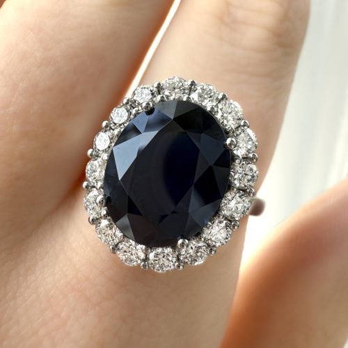 J5152 – Sapphire Halo Ring On Finger