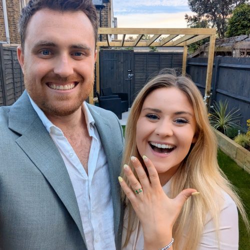 Bride and groom displaying bespoke custom wedding ring
