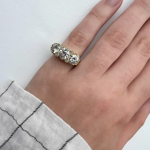 Old Cut Diamond Custom Three Stone Engagement Ring on hand