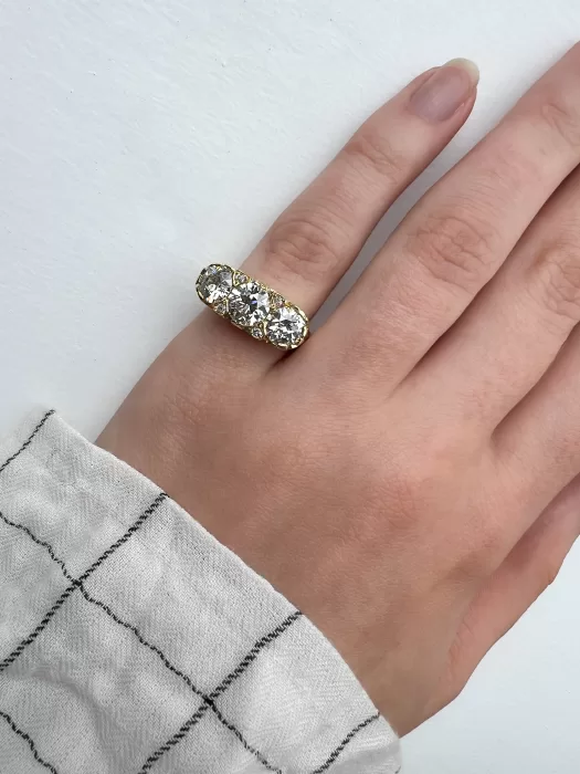 Old Cut Diamond Custom Three Stone Engagement Ring on hand