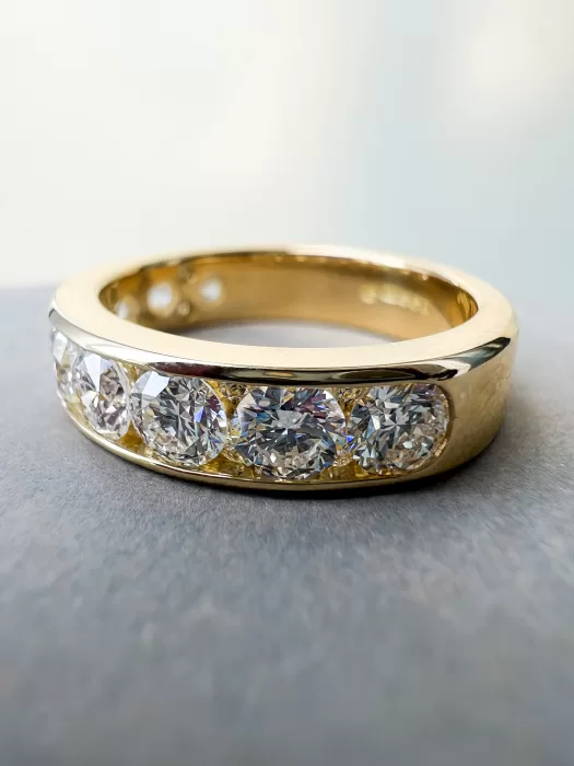 Bespoke Eternity Style Diamond Engagement Ring on table