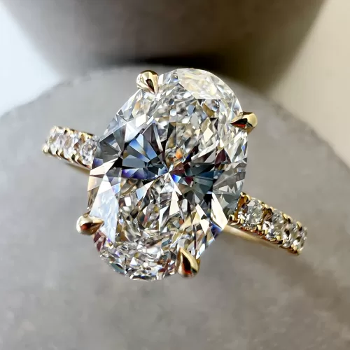Bespoke oval diamond engagement ring