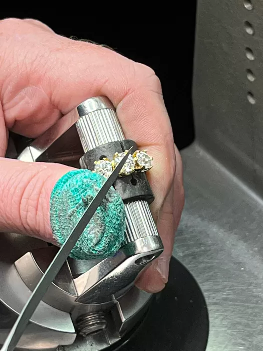 Custom Old Cut Diamond Three-Stone Ring in workshop
