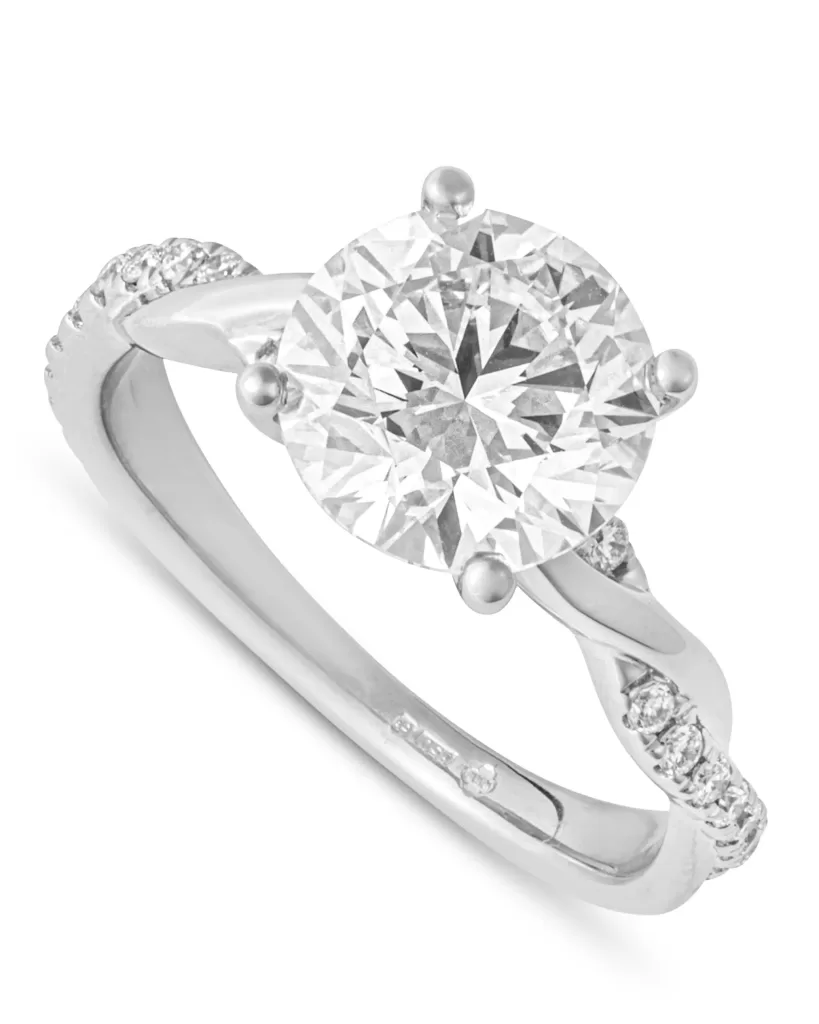Bespoke diamond solitare engagement ring with twisted band