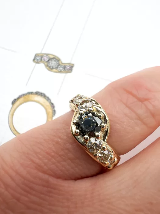salt and pepper diamond bespoke engagement ring on finger