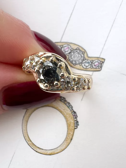salt and pepper diamond bespoke engagement ring in hand