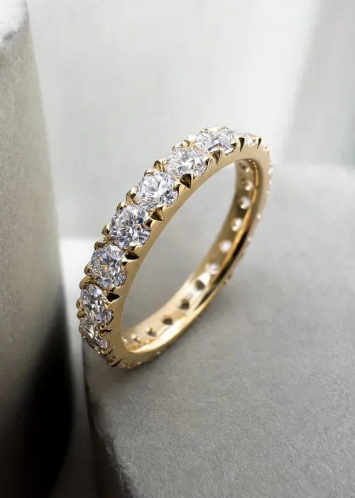 Bespoke Diamond Eternity Ring on concrete table