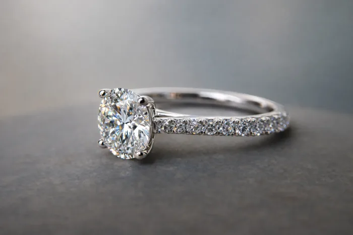 Platinum Solitaire Engagement Ring on table